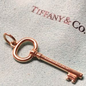 Tiffany & Co. 18k Gold oval key pendant